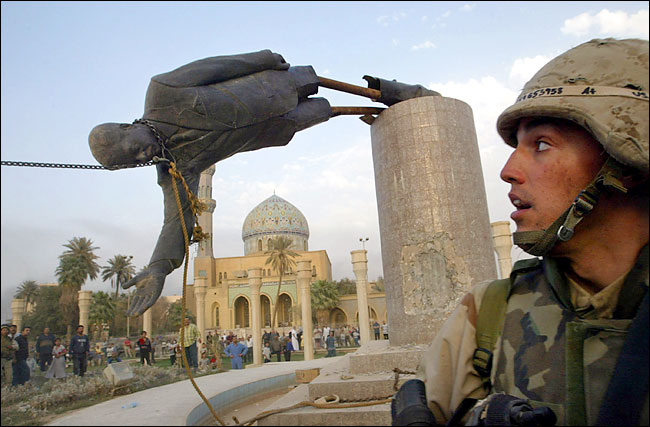 U.S. troops pulled down the 40 ft. statue of Saddam Hussein, central Baghdad, April 9, 2003.